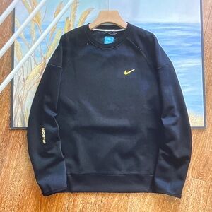 Nike x Nocta Black Crewneck Sweatshirt with Yellow Swoosh
